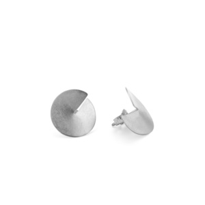 Two 15mm diameter circular stud earrings in sterling silver. They are cut to their centre and bent up a little, which causes a three-dimensional looking gap. The pin is soldered to the centre and fitted with an ear nut as a lock.