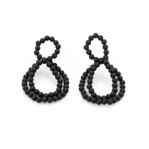 Earrings made of small matte Onyx beads strung into interlocking loops on nylon and equipped with a silver stud.