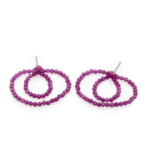 Earrings made of small Rubellite beads, flexibly strung into two interlocking loops and equipped with a silver stud.