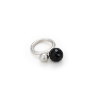 Silver ring with an 8mm silver and a 12mm faceted onyx ball.
