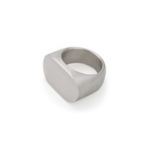 Solid signet ring made of sterling silver with an oval, concave ring head.