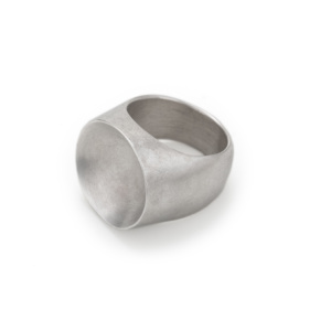 Signet ring made of solid sterling silver. The circular seal plate is concave.