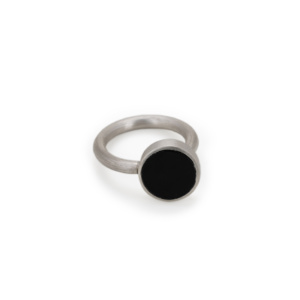 Silver ring with round stone.